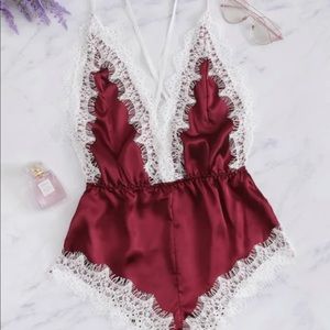 Cross Cross Lace Trim Romper bodysuit